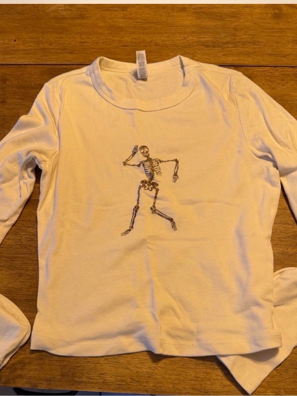 Bella Canvas Cream Long Sleeve Shirt with Skeleton Graphic
